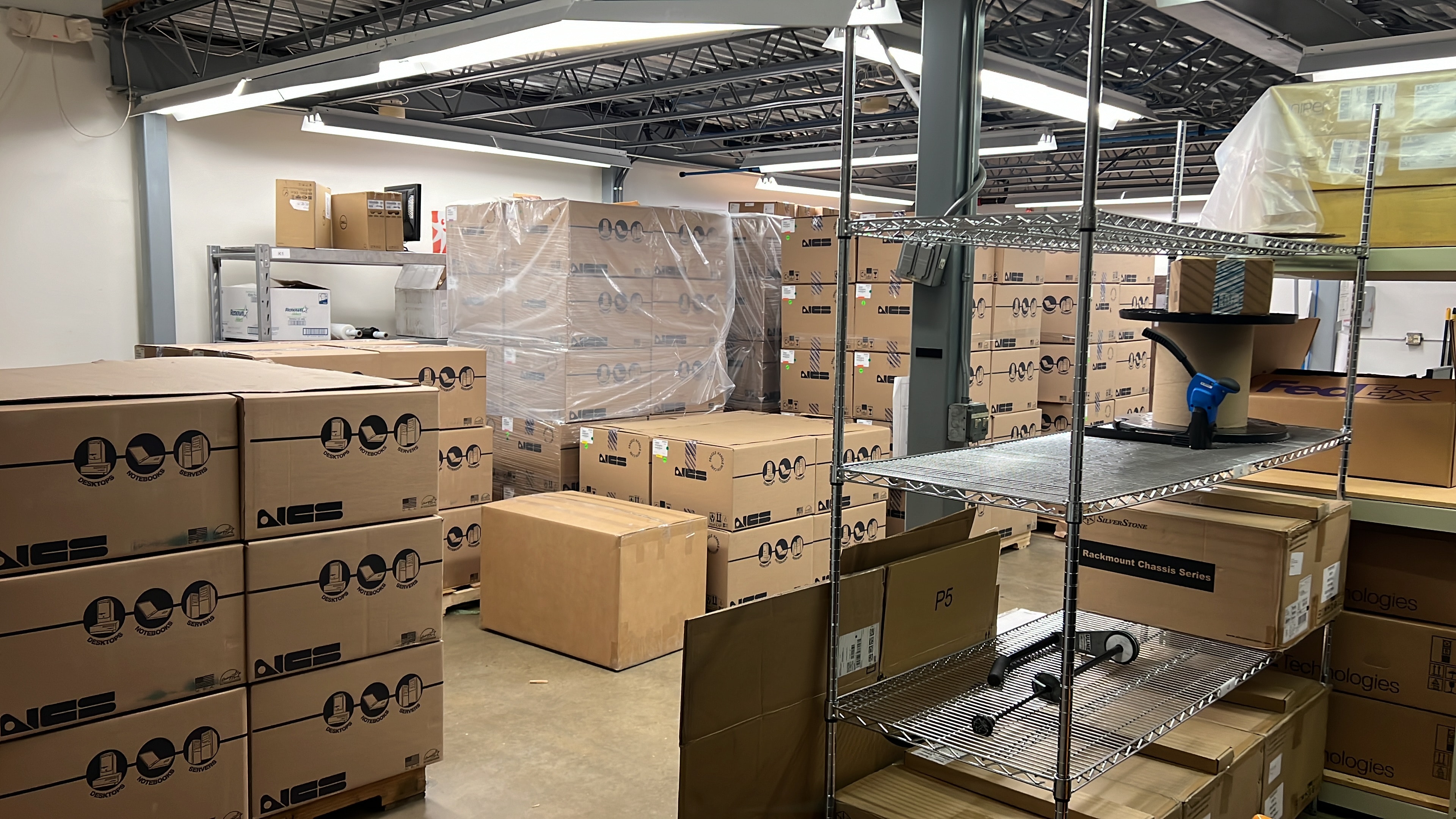 JIRACOR warehouse interior showing organized inventory, stacked boxes, and material staging at the Orlando facility